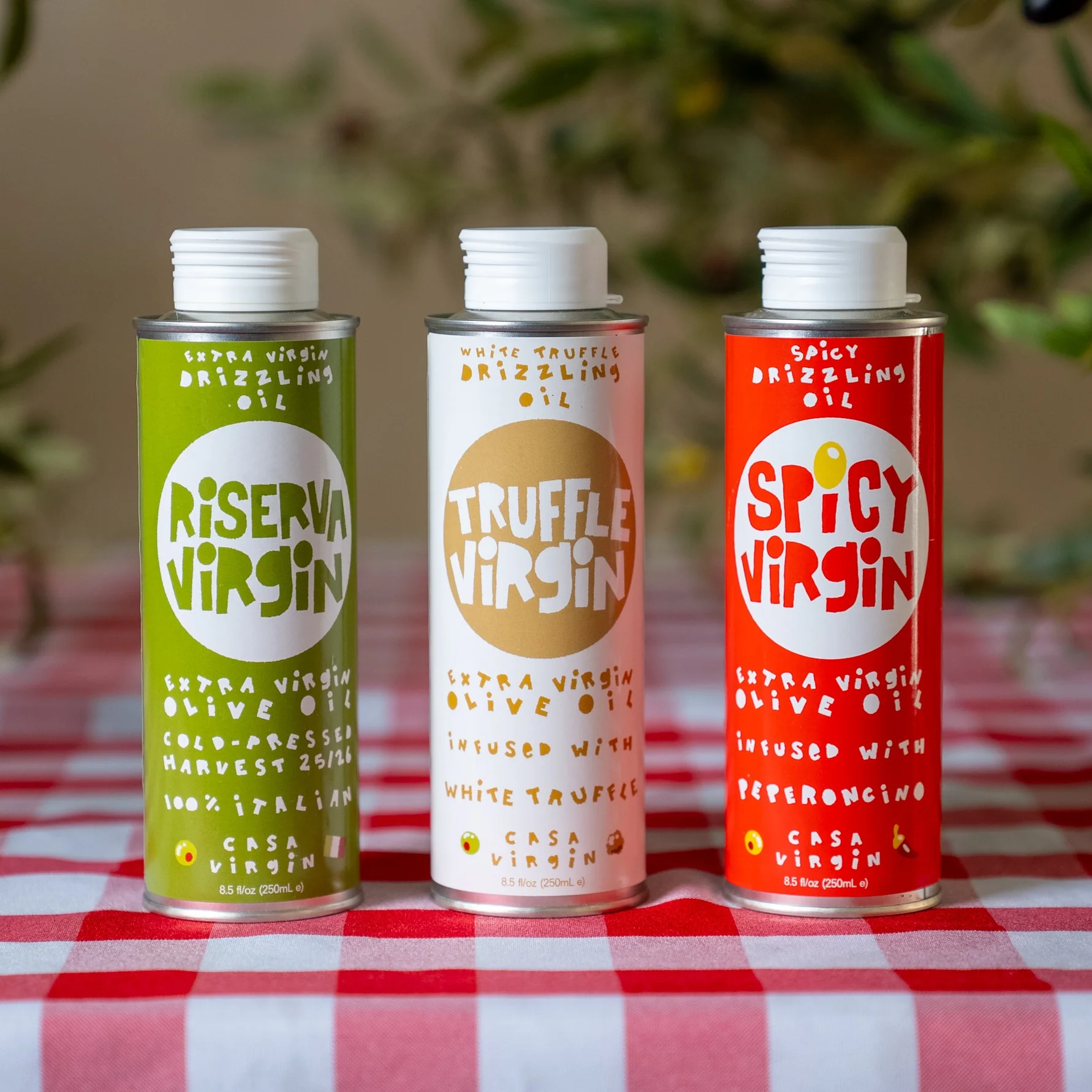 Casa Virgin Riserva, Truffle, and Spicy olive oil tins